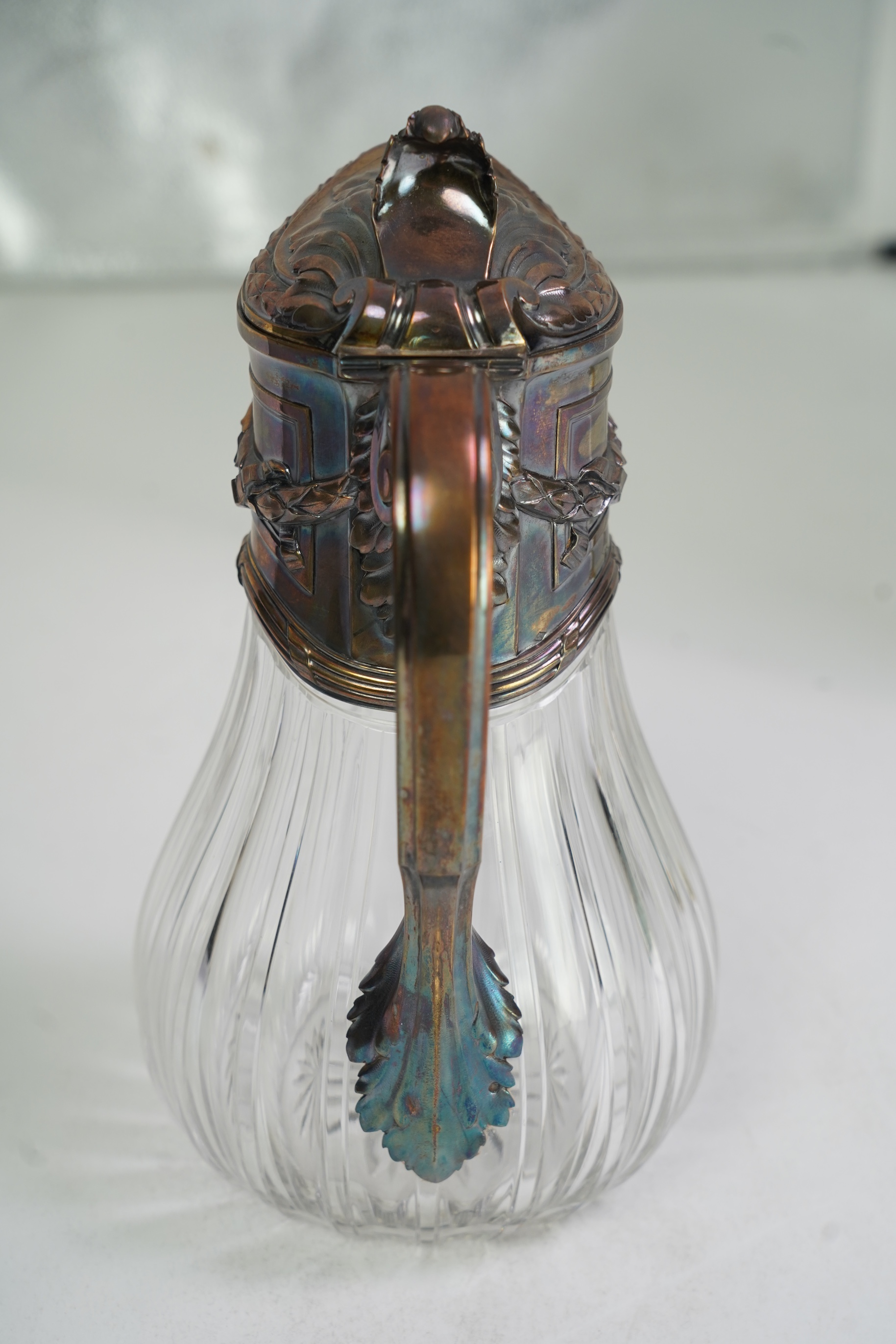 An early 20th century French 950 standard white metal mounted glass claret jug, by Risler & Carre
